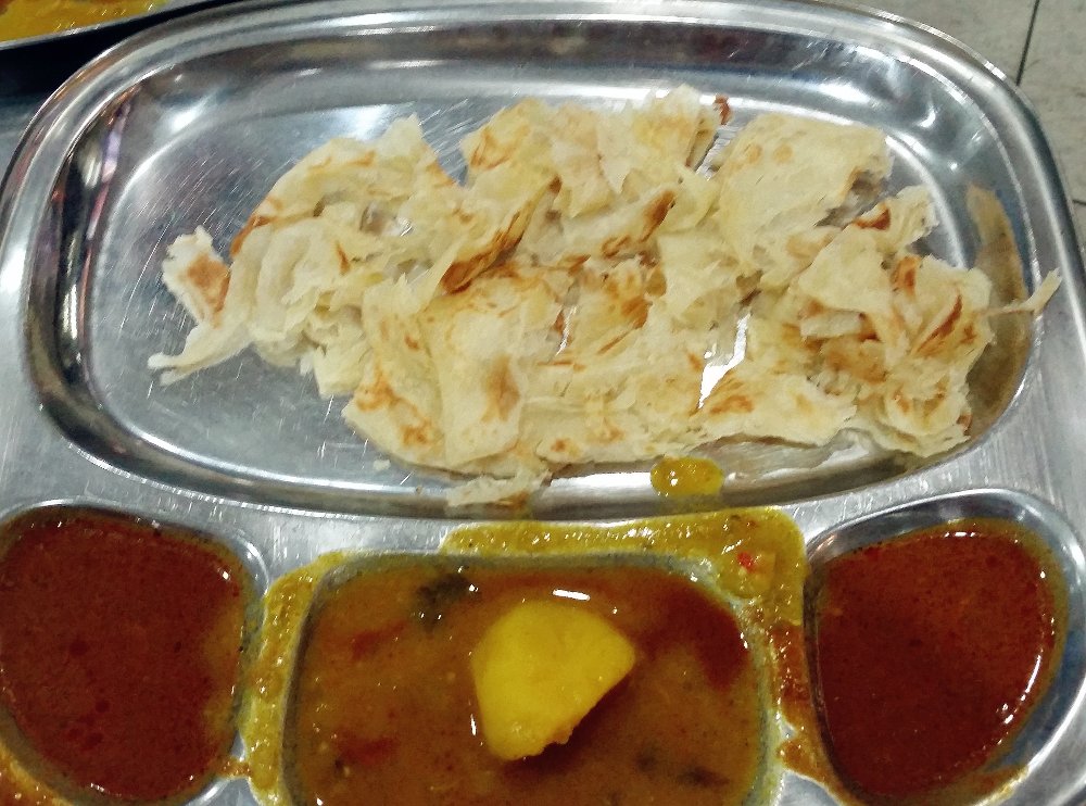 Delicious Roti Canai can be served sweet or savoury (as pictured here)