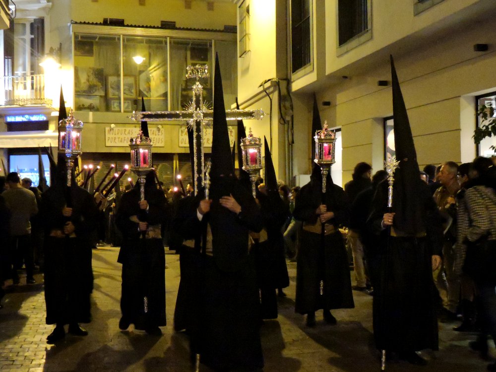 Los Nazarenos marching the streets in silence