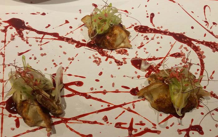 Pekinese dumplings and Pig’s ear with strawberry hoisin sauce